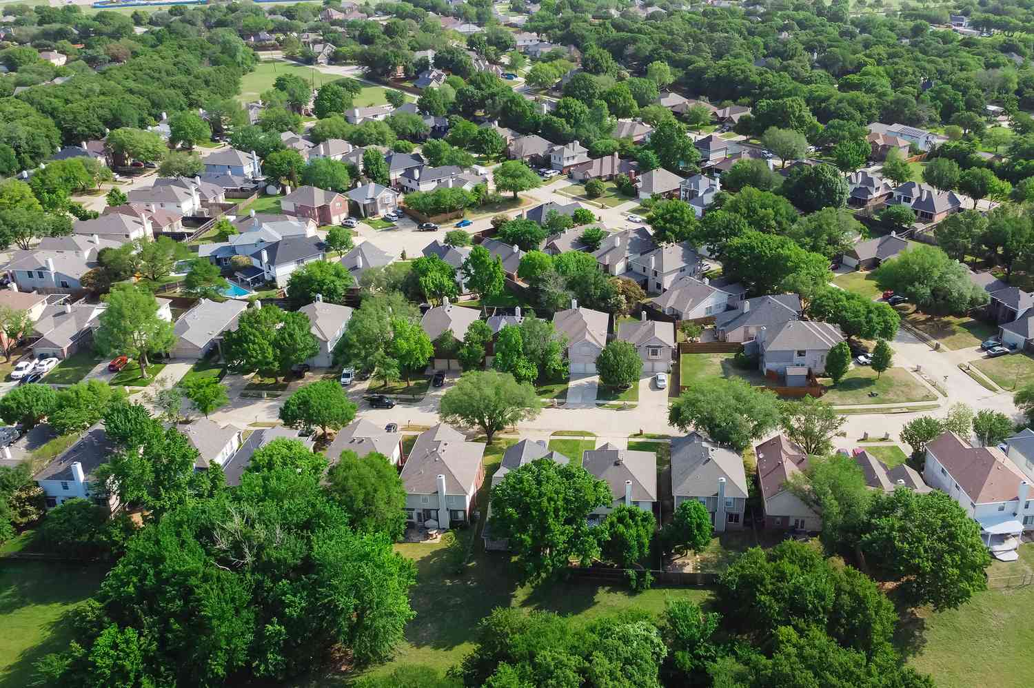Home with lights on during an outage, protected by a HomeSafe standby generator