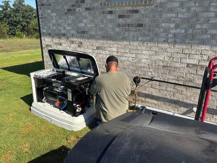 HomeSafe team installing a standby generator