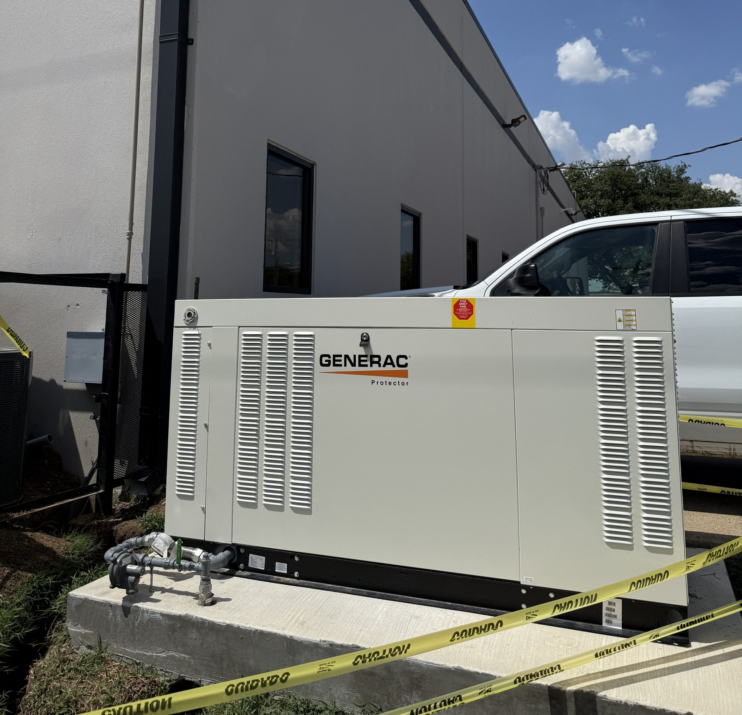 48 kW liquid-cooled standby generator with custom locking enclosure at Communication Concepts in Haltom City, Texas